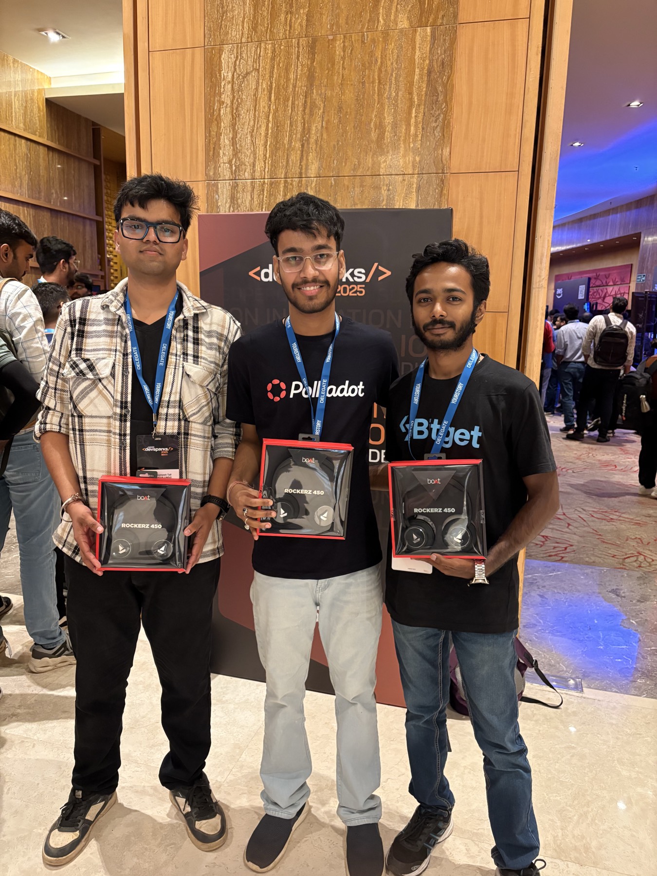 Somesh and teammates holding a hackathon award