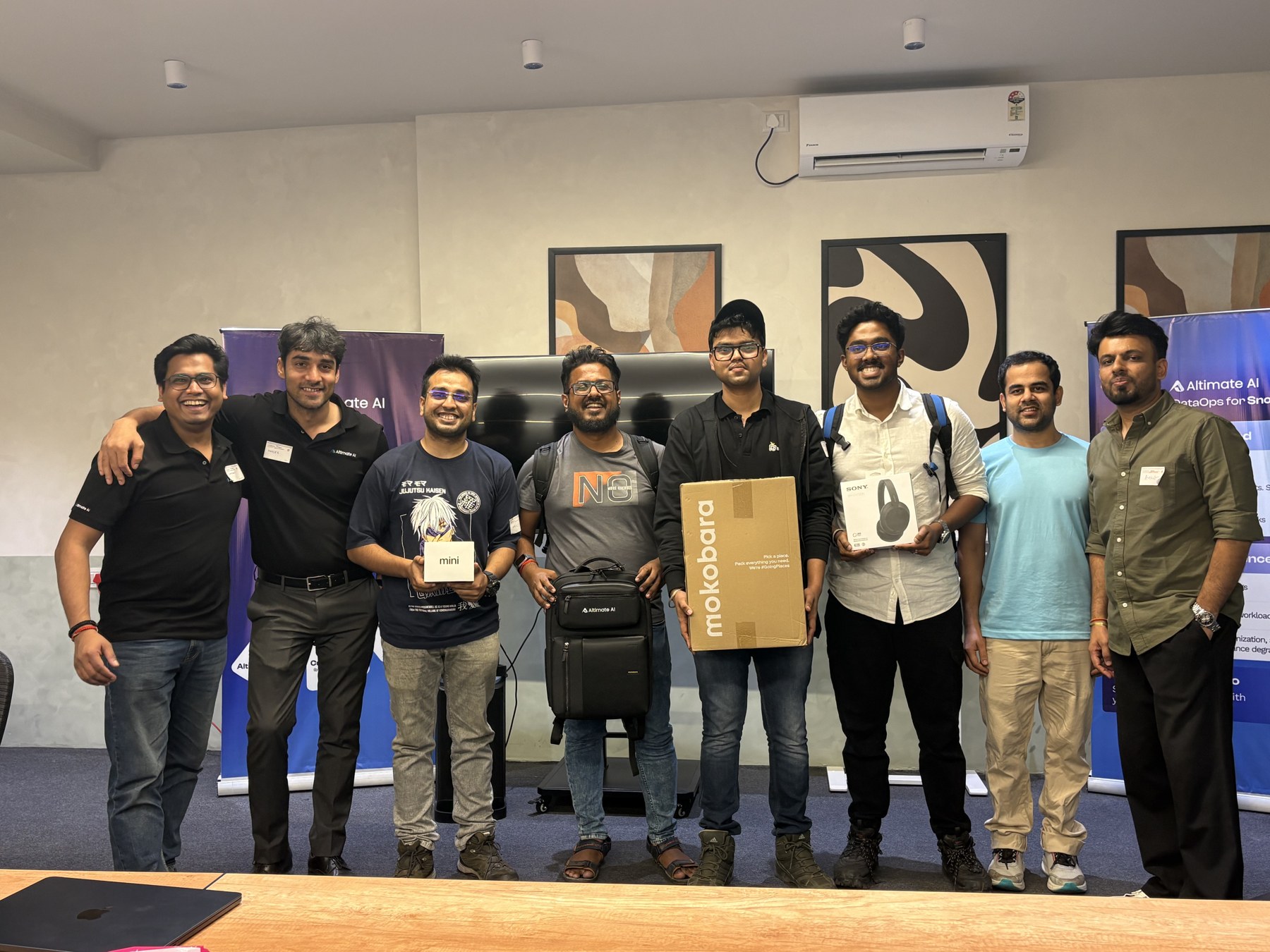Somesh and fellow builders posing with awards